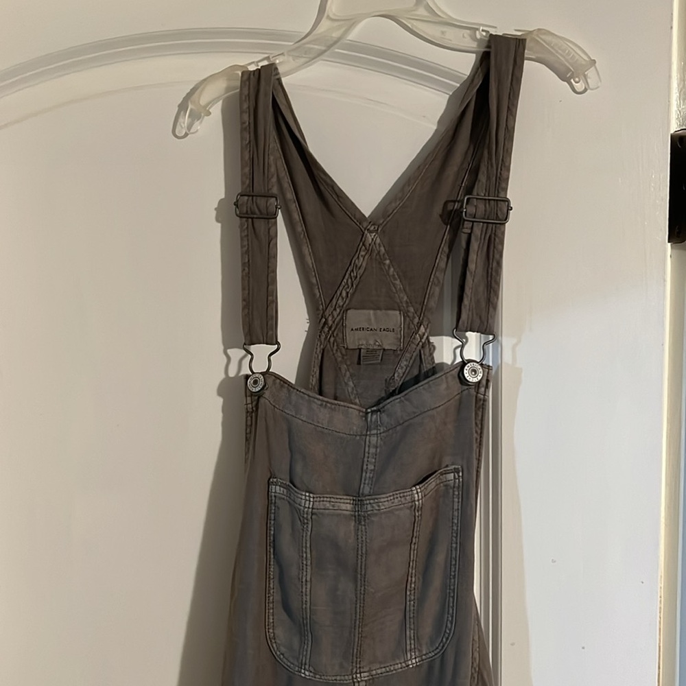 American Eagle stretch baggy overalls olive colored size medium NWT